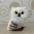 Hedwig owl toy, a 7cm snowy owl plush doll with adorable features, perfect for collectors and fans of magical stories.