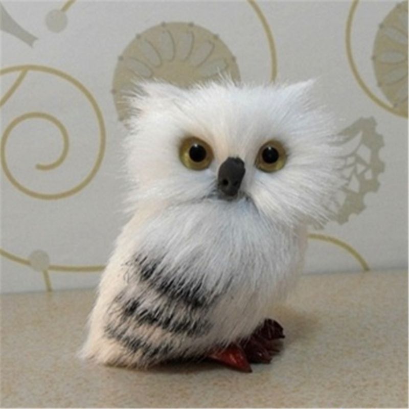 Hedwig owl toy, a 7cm snowy owl plush doll with adorable features, perfect for collectors and fans of magical stories.